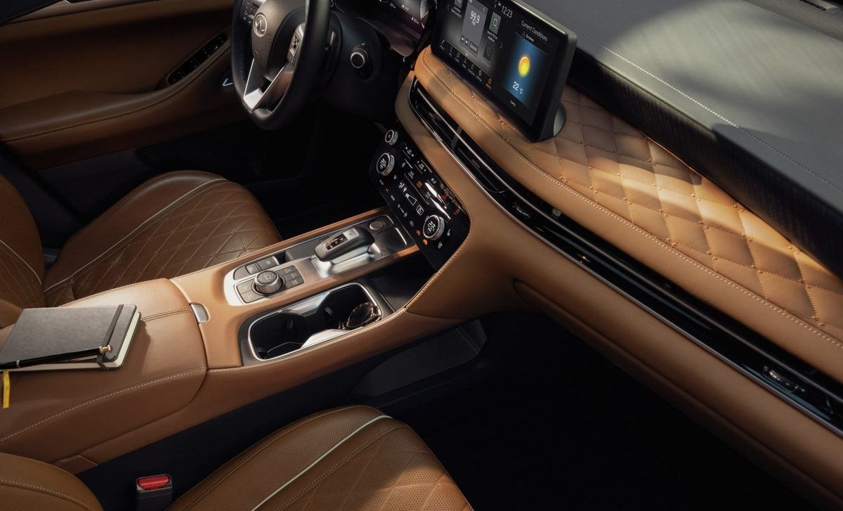 2022-infiniti-qx50-suv-driving-road.jpg.ximg.l_12_h.smart.jpg